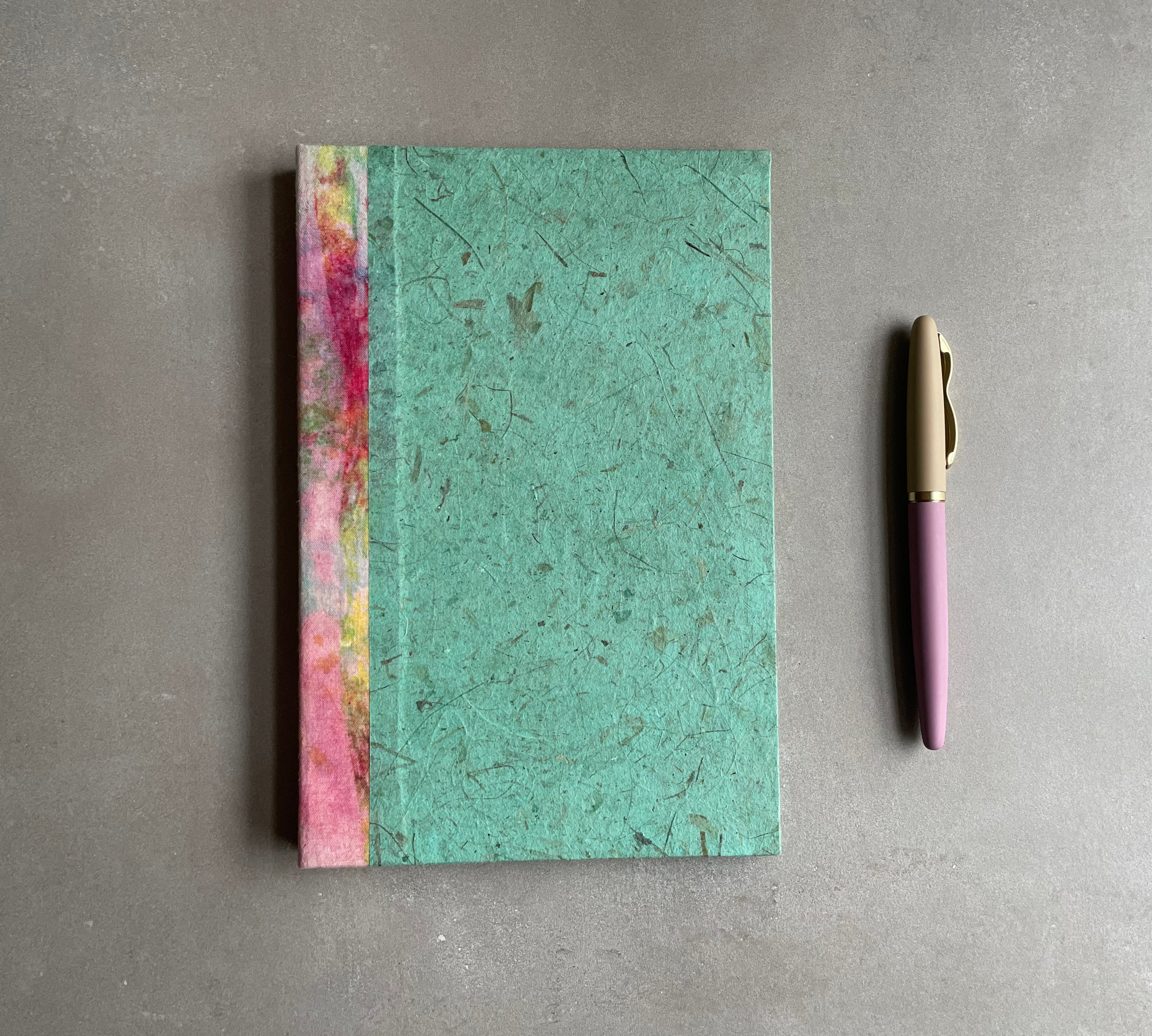 Handmade book, a work of art, bound in green woven book cloth, and wood, with original block outlets print art on cover. Journal, diary, sketchbook.