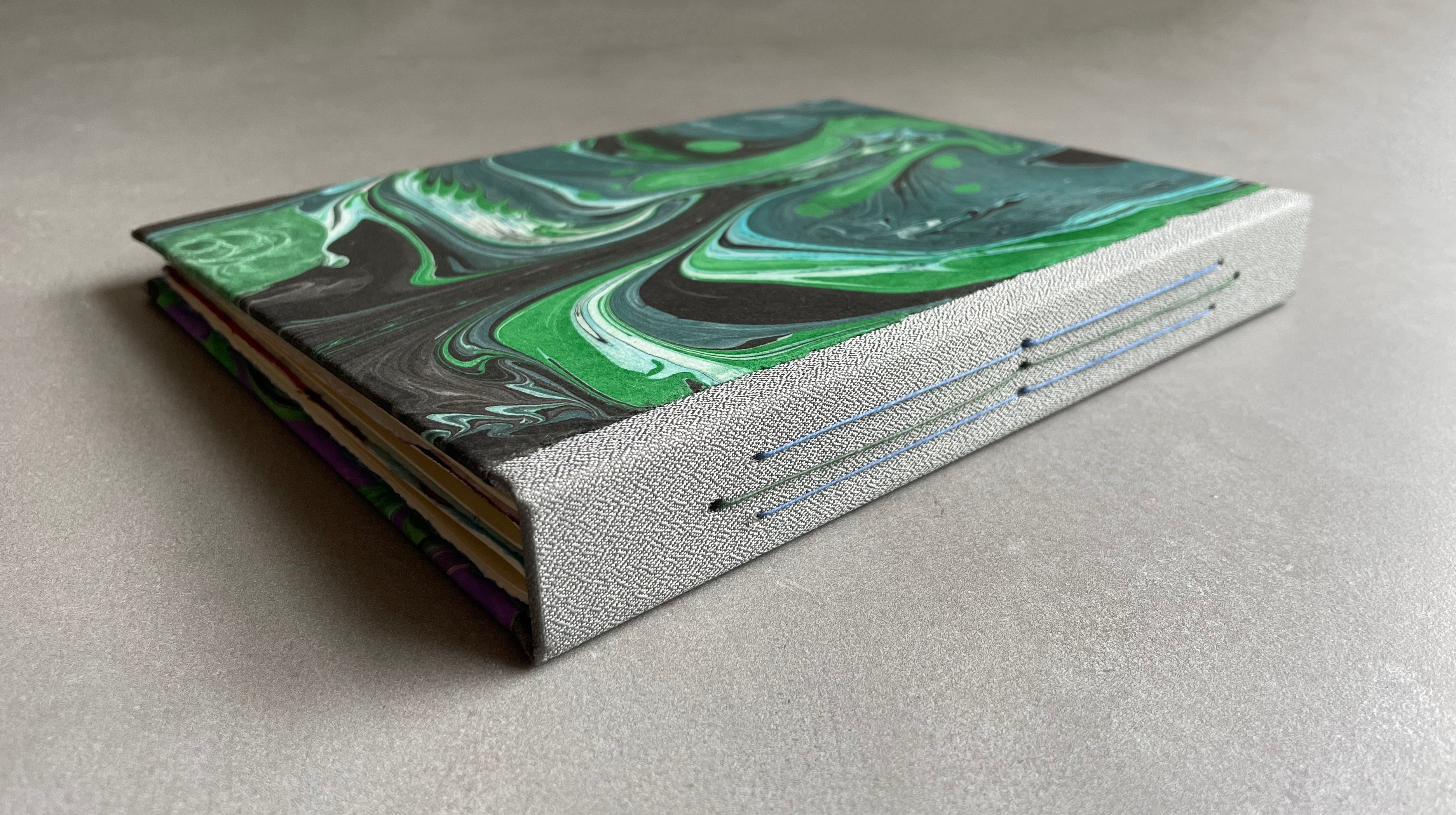 Hand bound Journal with Marbled Paper Cover. Hardcover, unique handmade book with decorative binding. - Hearty Greetings