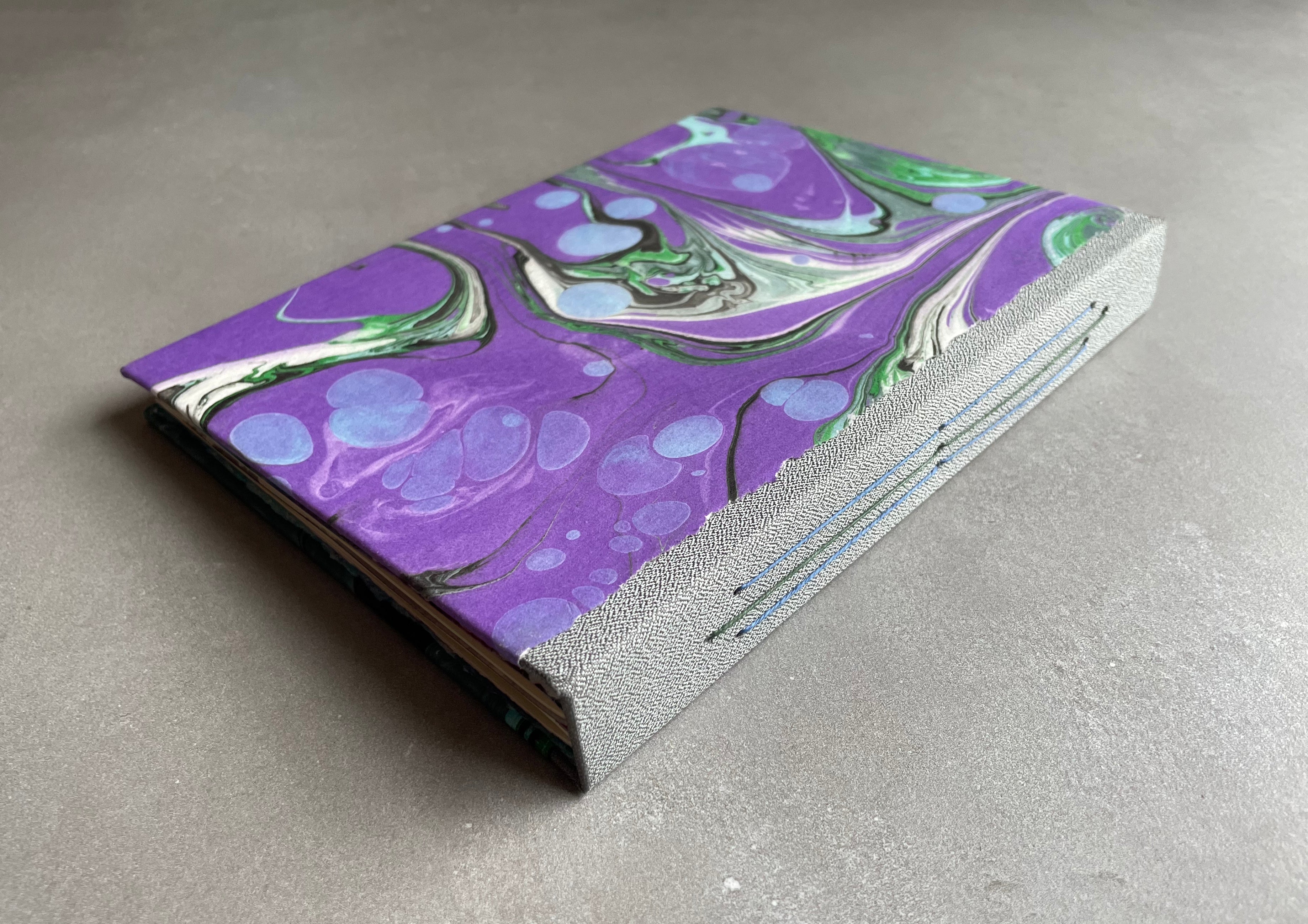 Hand bound Journal with Marbled Paper Cover. Hardcover, unique handmade book with decorative binding. - Hearty Greetings